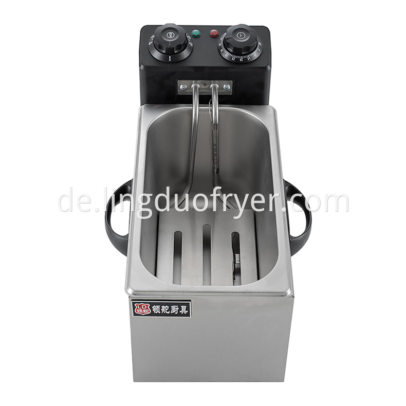 Professional electric fryer is used in snack bar